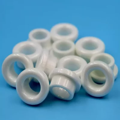 Diamond-polished ceramic eyelet for cable, wire and fibers